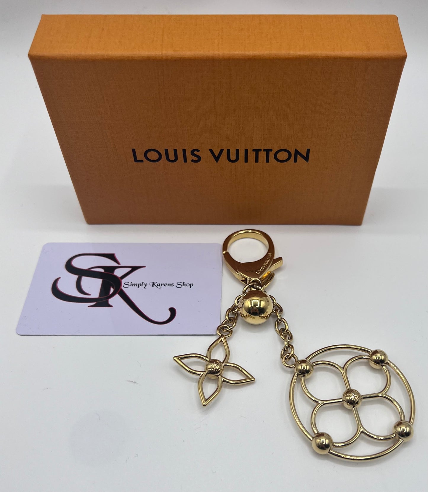 LV BLOOMY GOLD PLATED BAG CHARM