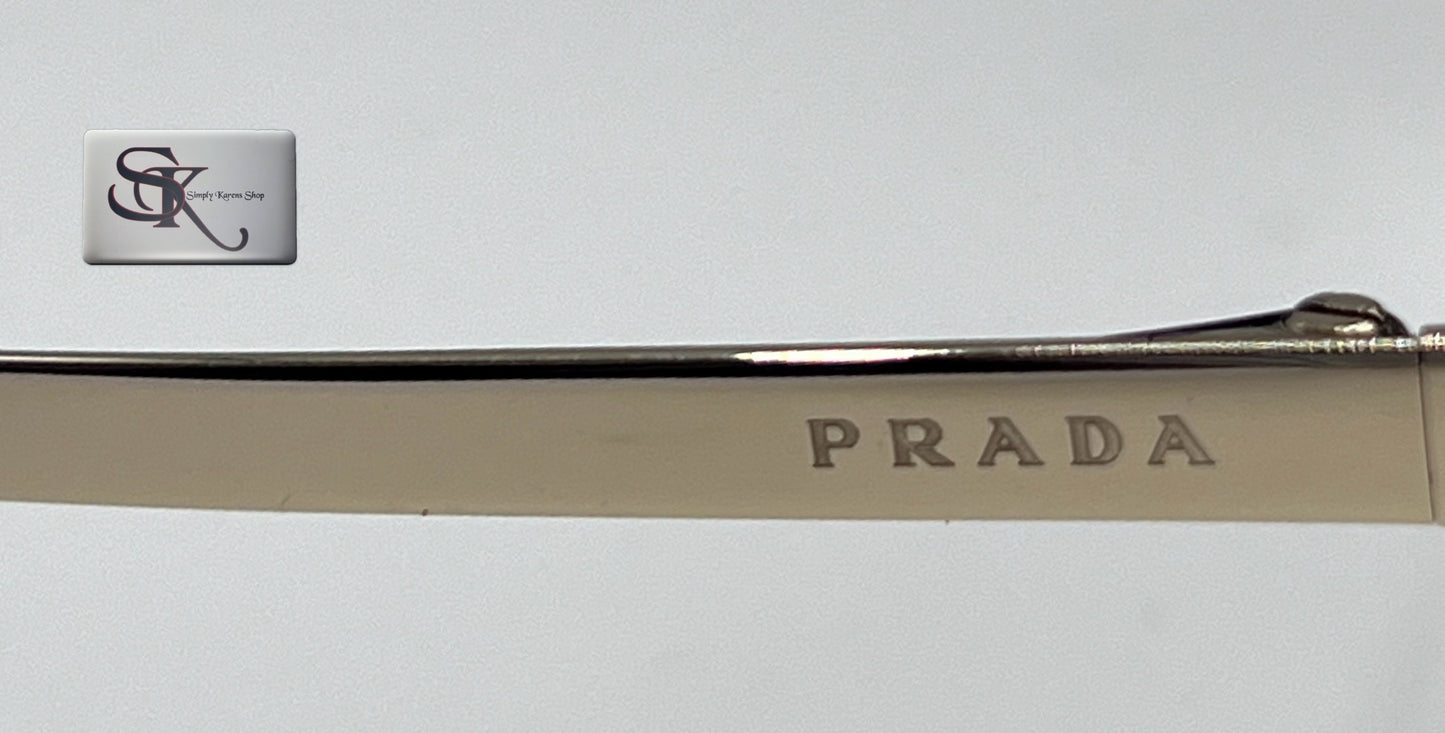 PRADA SPR50T SUNGLASS S140