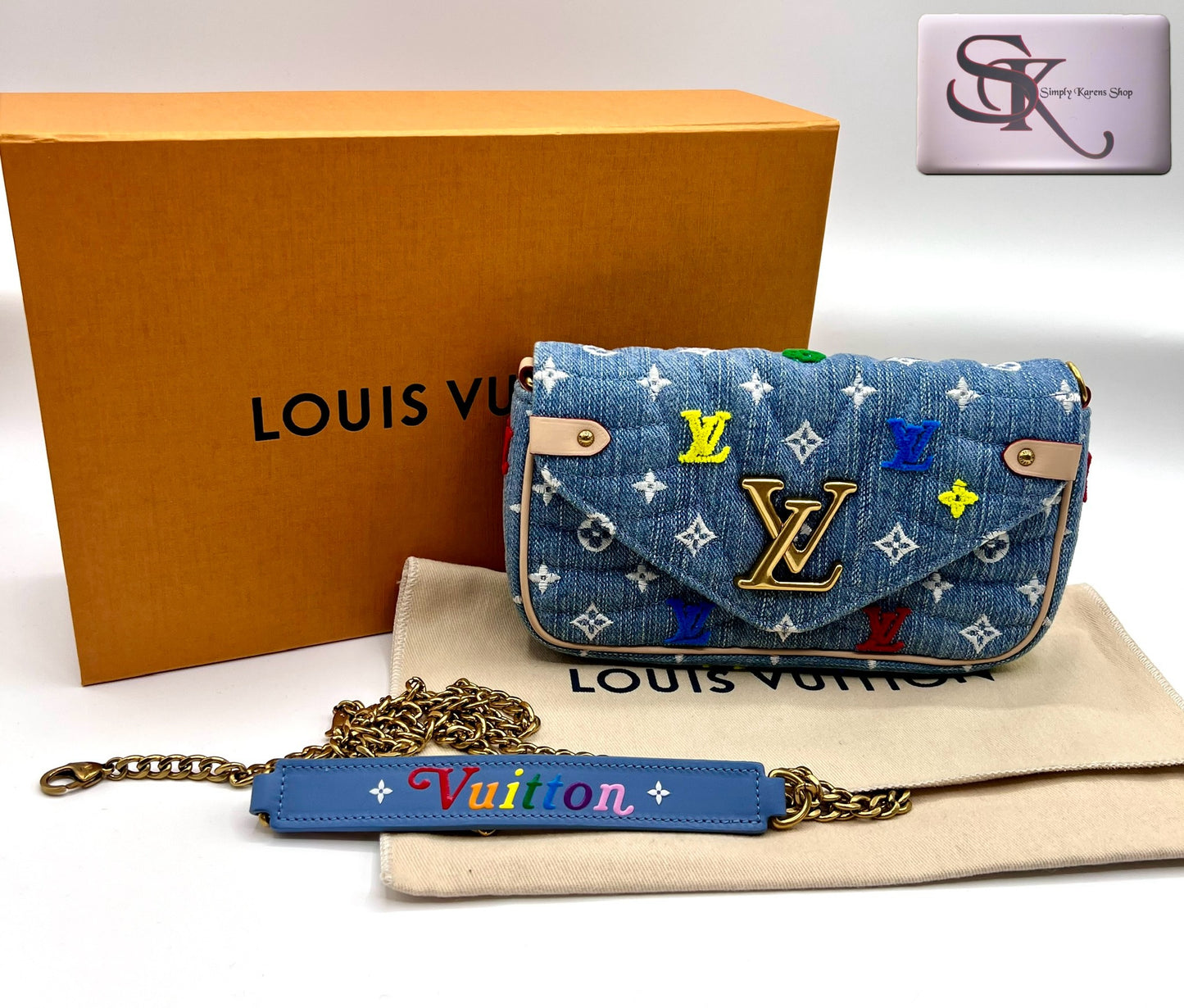 Lv embroidered Monogram Denim New Wave Chain Pochette Blue