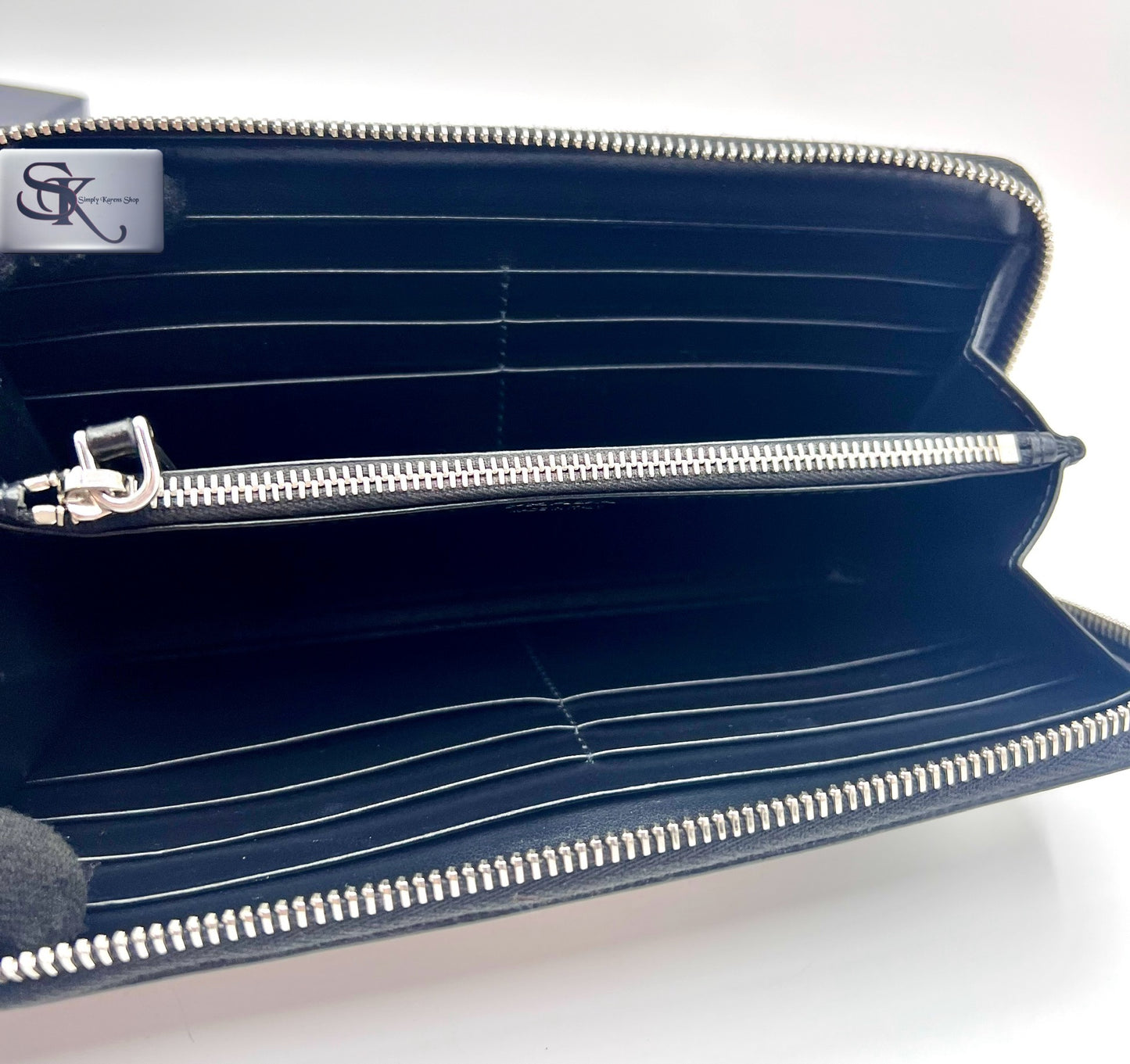 Prada Saffiano Black zip around long wallet